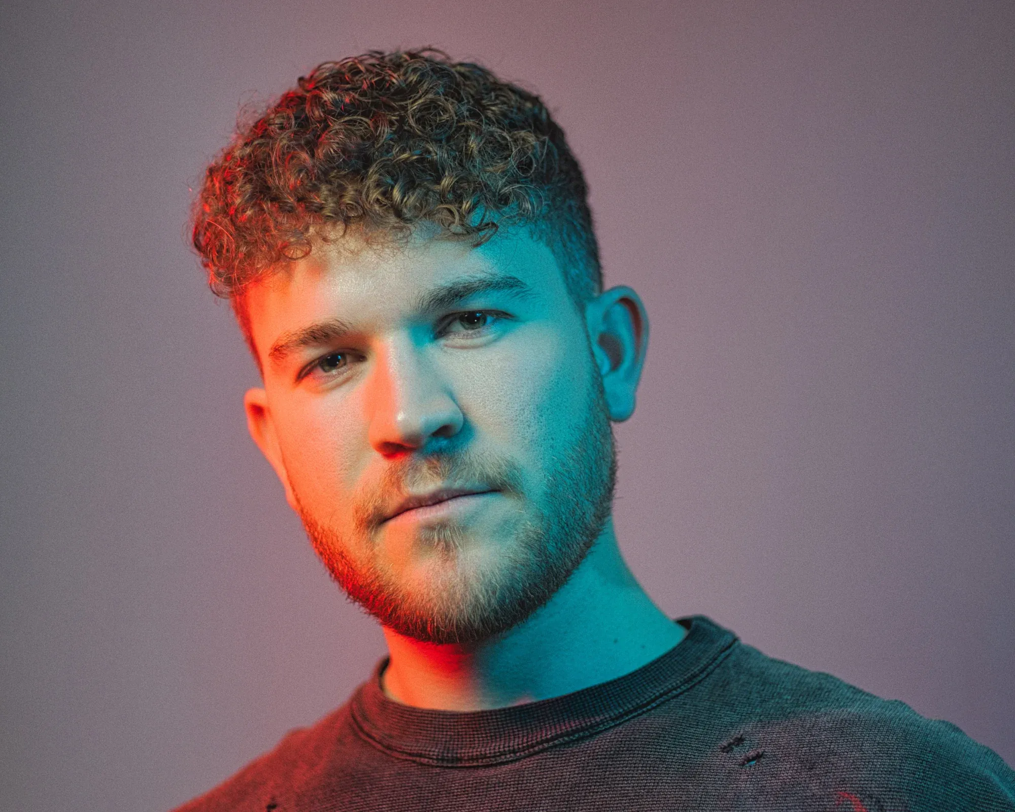 Jay Eskar in a studio portrait
